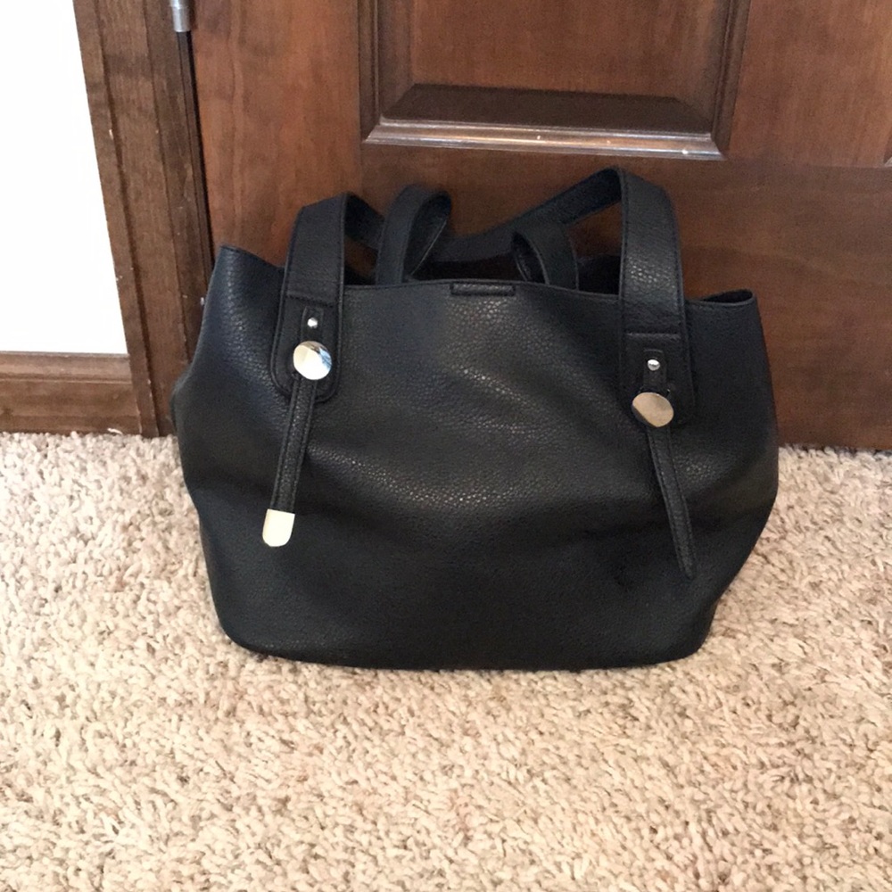 Super cute black purse from Charming Charlie’s! ❤️